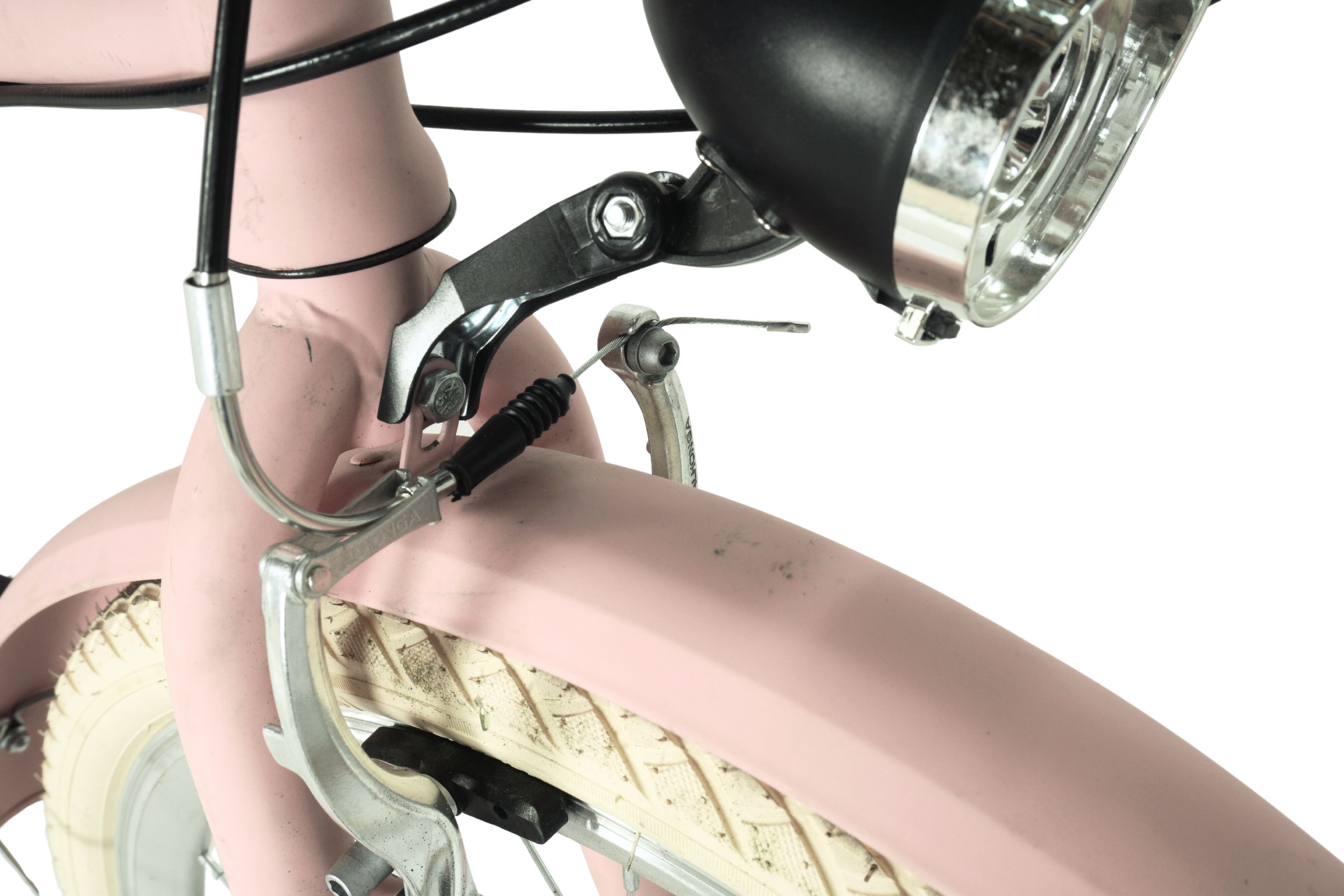 Rózsaszín kerékpár kormány és lámpa részlete